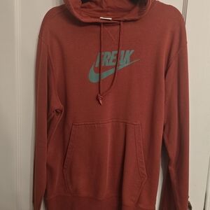 Nike Red Hoodie with Teal Logo